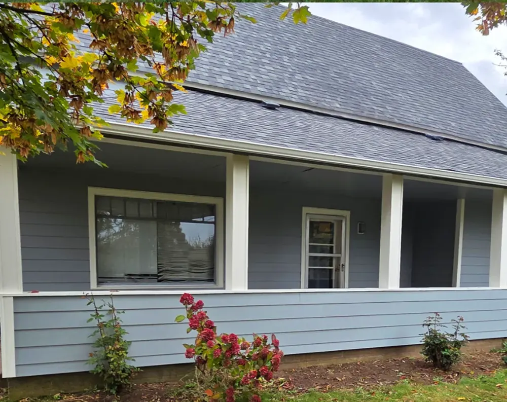 Completed roofing and siding project by Carter's Contracting, an Oregon coast custom home builder
